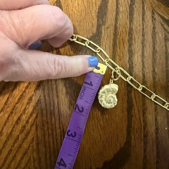 Gemelli Shell Huggie Charm on an Elegant Gold tone Necklace - Picture 3 of 3